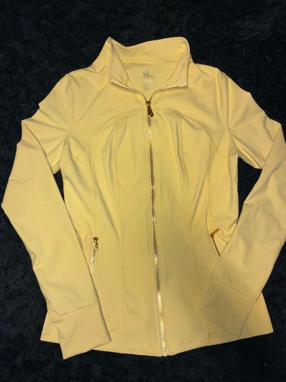 Uncia Active Women's Full-Zip Athletic Jacket in Yellow with Zipper Pockets